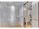 Unfinished storage area with vinyl flooring, wire shelving, and some hanging rods at 4814 Edmund Ct, Dover, FL 33527