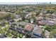 Aerial view featuring beautiful homes, lush trees, and a stunning skyline in the distance at 518 33Rd N Ave, St Petersburg, FL 33704