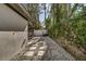 Backyard featuring stone pathway and lush greenery at 525 Lamara Ne Way, St Petersburg, FL 33704