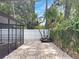 Backyard featuring screened porch and pavers at 525 Lamara Ne Way, St Petersburg, FL 33704