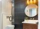 Stylish bathroom with designer tile, modern fixtures, and glass-enclosed shower at 525 Lamara Ne Way, St Petersburg, FL 33704