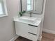 Modern bathroom featuring a sleek floating vanity with vessel sink, and minimalist black hardware at 525 Lamara Ne Way, St Petersburg, FL 33704