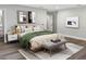 This main bedroom has neutral décor, hardwood floors, and bright, natural lighting at 525 Lamara Ne Way, St Petersburg, FL 33704