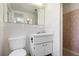 Cozy bathroom with tile floor, vanity and vintage tile in walk-in shower at 5313 Mosaic Dr, Holiday, FL 34690