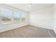 Bedroom with large windows and carpeting at 5955 Sweet Birch Dr, Riverview, FL 33578