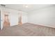 Spacious bedroom with carpet, walk-in closet, and ensuite bathroom at 5955 Sweet Birch Dr, Riverview, FL 33578