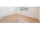 Neutral bedroom with tile floors and a large window with a view at 5955 Sweet Birch Dr, Riverview, FL 33578