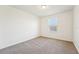 Bedroom featuring carpet flooring and a window with blinds at 5955 Sweet Birch Dr, Riverview, FL 33578