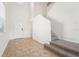 An inviting foyer with tile flooring, a staircase, and ample natural light at 5955 Sweet Birch Dr, Riverview, FL 33578