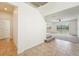A home foyer with tile flooring and stairs leading to the upper level at 5955 Sweet Birch Dr, Riverview, FL 33578