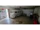 Spacious garage featuring a vintage van and ample room for storage and parking at 5998 8Th S St, St Petersburg, FL 33705