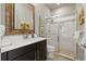 Bathroom with modern vanity and tiled shower at 9708 Highland Park Pl, Palmetto, FL 34221