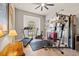 Spacious workout room with treadmill, exercise bike, weight machine, and ample natural light at 9708 Highland Park Pl, Palmetto, FL 34221