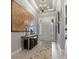 Inviting foyer with bright lighting, console table, and stylish decor welcomes guests at 9708 Highland Park Pl, Palmetto, FL 34221