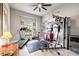Well-equipped home gym featuring a treadmill, weights, and fitness equipment for a complete workout experience at 9708 Highland Park Pl, Palmetto, FL 34221