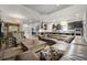 Expansive living area connecting to a modern kitchen, perfect for entertaining and Gathering time at 9708 Highland Park Pl, Palmetto, FL 34221