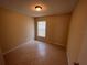 Bedroom with tile floors and neutral paint with a window at 10102 Cedar Dune Dr, Tampa, FL 33624