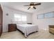 Bedroom featuring natural light, ceiling fan, neutral walls and flooring at 10535 109Th St, Largo, FL 33778