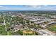 An aerial view of a neighborhood in Sarasota, FL, showcasing proximity to the coast, baseball field, and local business at 1081 N Euclid Ave, Sarasota, FL 34237