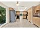 Spacious kitchen with stainless steel appliances, ample cabinet space, and a view of the backyard at 11712 Palmer Dr, Tampa, FL 33624