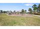 Fun community playground featuring swings, slides, and a safe, wood-chip ground cover at 11714 Wrought Pine Loop, Riverview, FL 33569