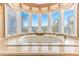 Luxurious soaking tub with stunning views from the bay window in the bathroom at 12808 Harborwood Dr, Largo, FL 33774