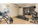 Home gym with various workout equipment, including a weight bench and a pull down machine at 12808 Harborwood Dr, Largo, FL 33774