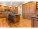 Well-appointed kitchen with granite countertops, custom cabinetry, and bar stool seating at 12808 Harborwood Dr, Largo, FL 33774