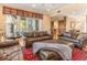Inviting living room with ample seating and a view to the waterfront at 12808 Harborwood Dr, Largo, FL 33774