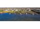 Waterfront property showcasing dock on bay, outlined property boundary, and waterfront access for boating at 12808 Harborwood Dr, Largo, FL 33774