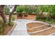 Charming home featuring a unique facade, a well-manicured lawn, and mature trees at 1301 45Th N Ave, St Petersburg, FL 33703