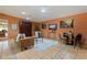 Spacious living room with tile floors, ceiling fans, and views from windows at 1301 45Th N Ave, St Petersburg, FL 33703
