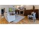 Bright living room featuring a fireplace, built-in cabinets, and a large window providing natural light at 1301 45Th N Ave, St Petersburg, FL 33703