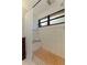 Tiled shower with built-in bench seating and neutral paint at 1301 45Th N Ave, St Petersburg, FL 33703