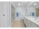Bright bathroom with walk-in shower, marble countertop, and neutral colors at 1319 Leland Dr # 101, Sun City Center, FL 33573