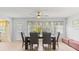 Charming dining area with contemporary furniture, natural light, and luxury vinyl floors at 1319 Leland Dr # 101, Sun City Center, FL 33573