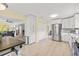 Spacious kitchen featuring white cabinetry, stainless steel appliances, and lots of space at 1319 Leland Dr # 101, Sun City Center, FL 33573