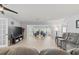 Living room with dining area has lots of natural light and modern floors at 1319 Leland Dr # 101, Sun City Center, FL 33573