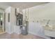 Utility room with modern water heater, HVAC system, and wash sink at 1319 Leland Dr # 101, Sun City Center, FL 33573