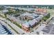 Scenic aerial view of community featuring multiple buildings, pool, and convenient parking at 1810 E Palm Ave # 4304, Tampa, FL 33605