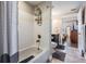 Cozy bathroom featuring a shower-tub combo, sleek fixtures, and a modern vanity with dark wood at 1810 E Palm Ave # 4304, Tampa, FL 33605