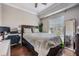 Cozy bedroom with a comfortable bed, side desk, and ample natural light at 1810 E Palm Ave # 4304, Tampa, FL 33605