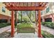 Inviting courtyard featuring a park bench, beautiful landscaping, and a serene fountain at 1810 E Palm Ave # 4304, Tampa, FL 33605