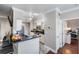 Modern kitchen with granite countertops, stainless steel appliances, and bar seating at 1810 E Palm Ave # 4304, Tampa, FL 33605