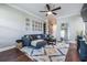 Relaxing living area featuring a comfortable gray sofa, decor, and ample space at 1810 E Palm Ave # 4304, Tampa, FL 33605