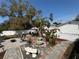Outdoor kitchen and landscaping provide a quiet setting to relax and enjoy the backyard at 1874 N Washington Ave, Clearwater, FL 33755