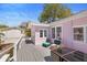 Outdoor deck with ample room for seating offering an ideal space for outdoor relaxation at 1874 N Washington Ave, Clearwater, FL 33755