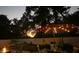 Backyard with outdoor seating and a fire pit at 1874 N Washington Ave, Clearwater, FL 33755