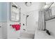 Beautiful bathroom featuring white subway tile, stylish fixtures, and classic design elements at 1874 N Washington Ave, Clearwater, FL 33755