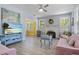 Bright living room with fireplace and multiple windows provide ample natural light at 1874 N Washington Ave, Clearwater, FL 33755
